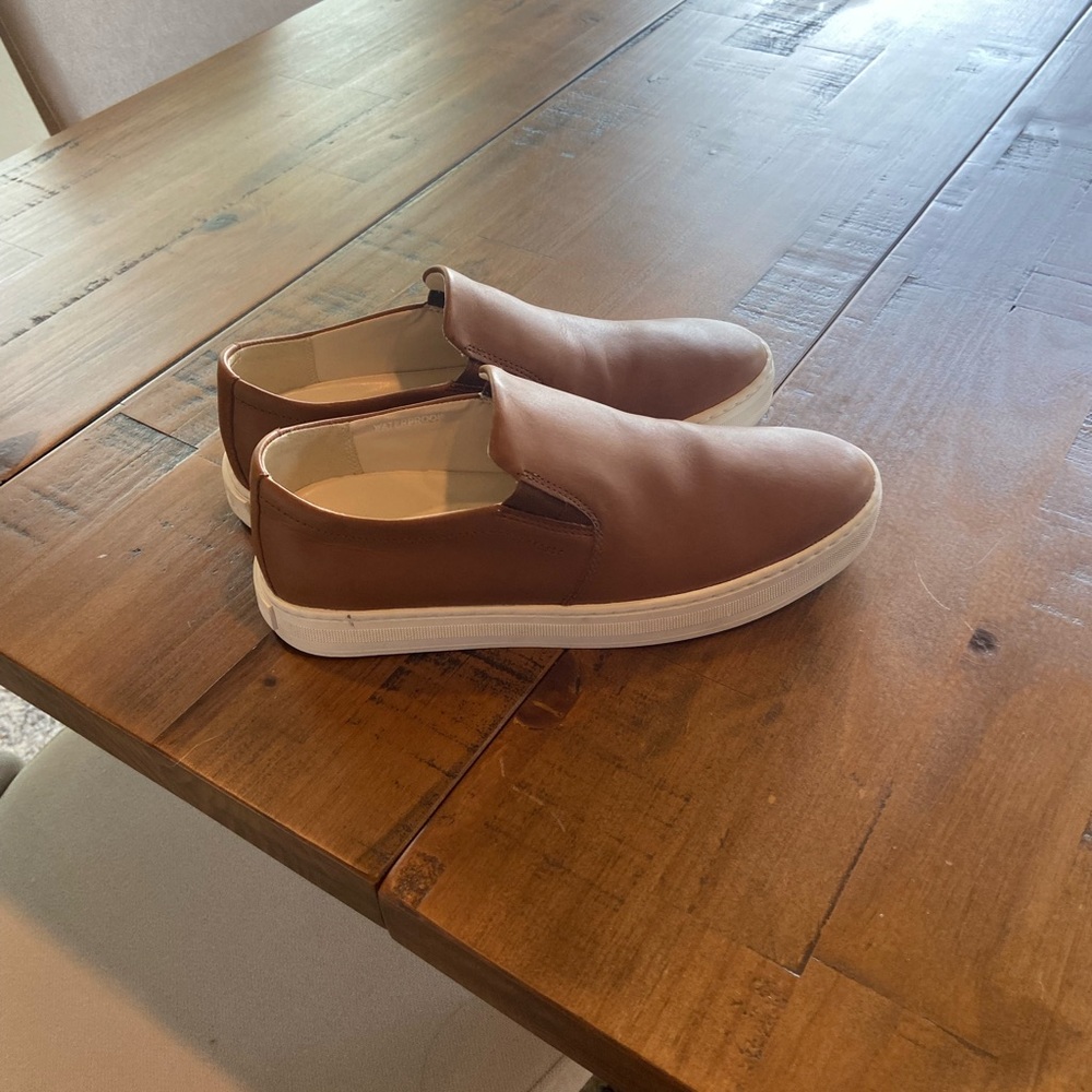Sorel tan slip on shoes. Mens 7